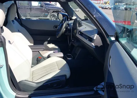 2025 Mini Convertible Cooper S z USA, uszkodzony, nr VIN WMW23GX00S2X61386